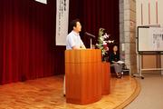 総会であいさつをする高尾　誠会長
